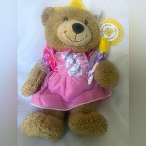 Build a Bear, brown with pink dress, crown and holding a wand